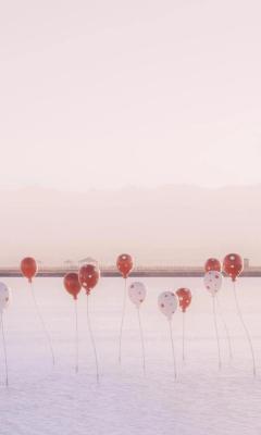 冰湖上的波点气球手机壁纸